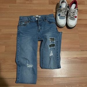 Straight leg, destructed denim